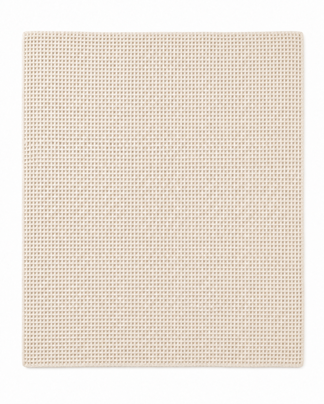 A rectangular woven throw blanket in a light beige color, featuring a textured basketweave pattern, shown flat against a white background.
